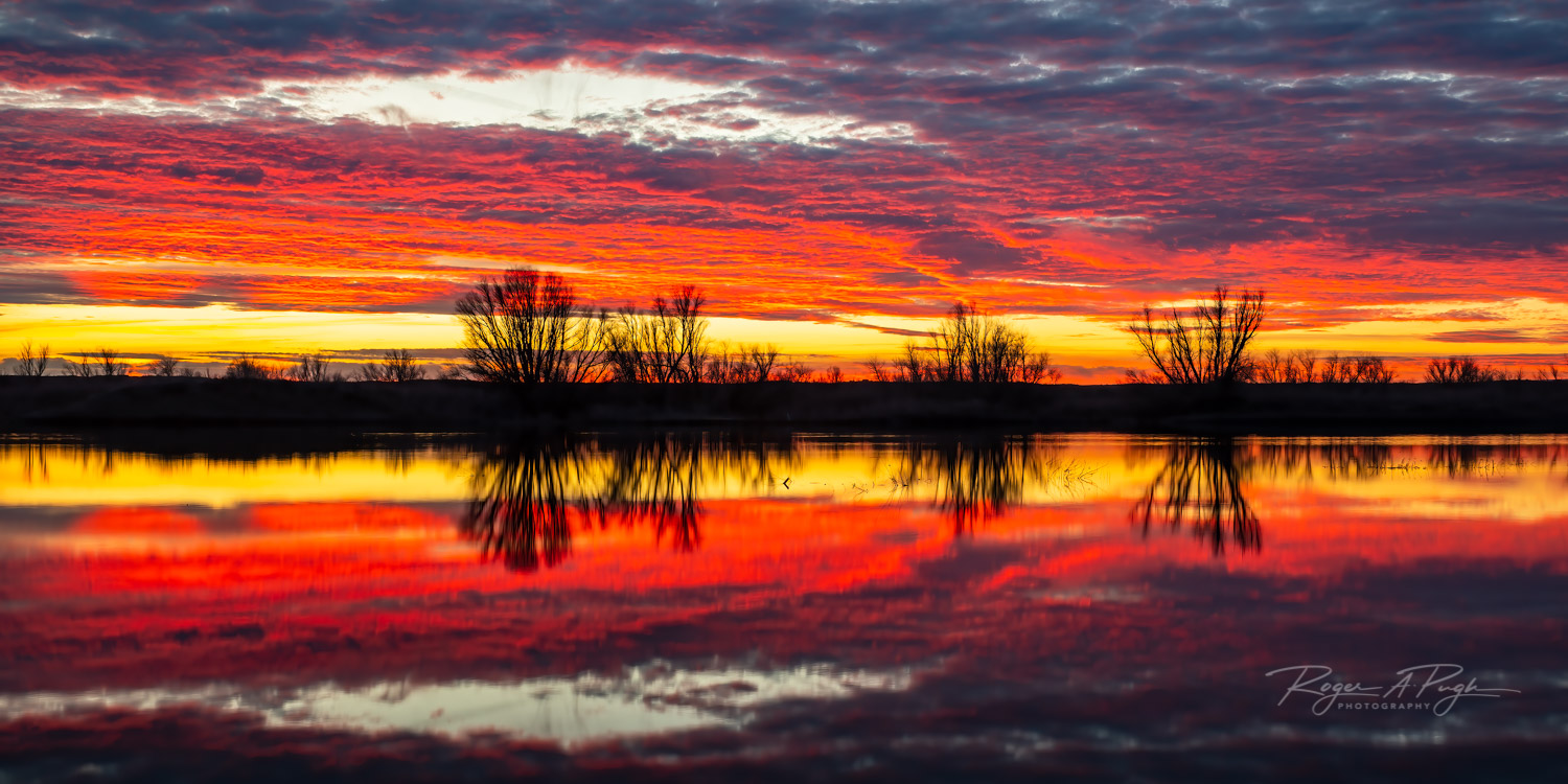 Fantastic mirrored sunset over Potholes Reservoir, Washington.